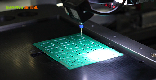 PCB router machine processing a medical device PCB with HEPA-filtered dust extraction.