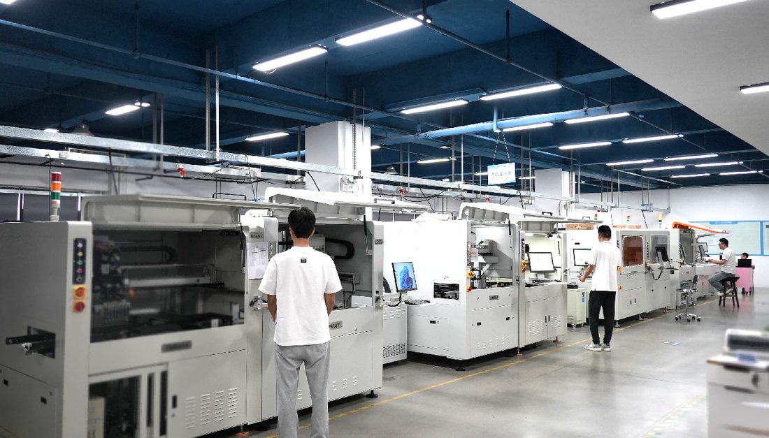 PCB router machine processing miniaturized IoT boards — high-precision inline router.